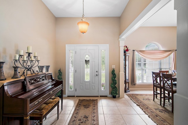 entrance foyer with light tile patterned floors