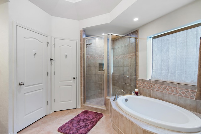 bathroom featuring independent shower and bath and tile patterned floors