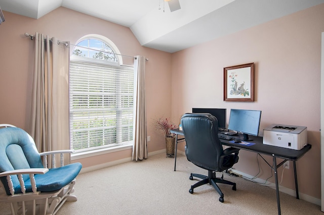 carpeted home office featuring ceiling fan and lofted ceiling