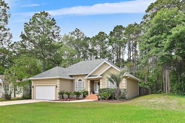 single story home with a front yard and a garage