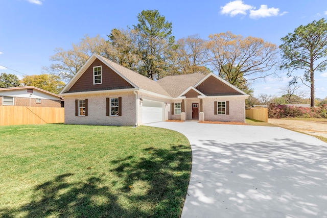 craftsman-style home with a front yard and a garage