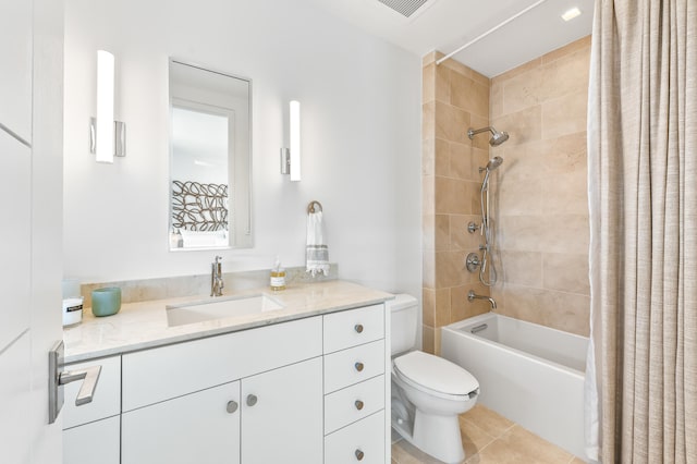 full bathroom featuring toilet, tile flooring, vanity, and shower / bath combination with curtain