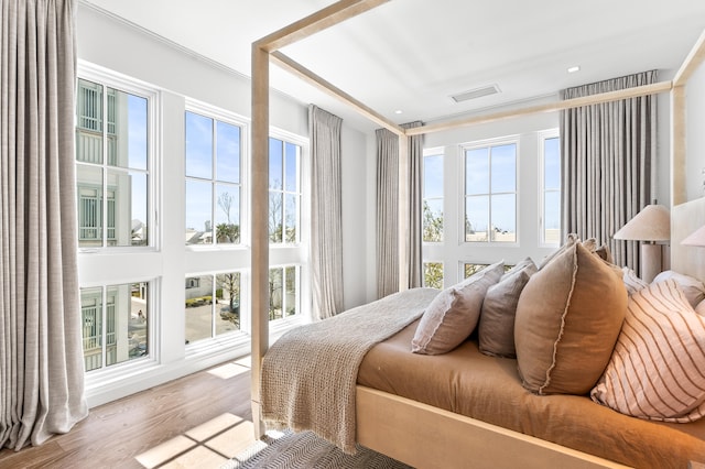 bedroom with light wood-type flooring