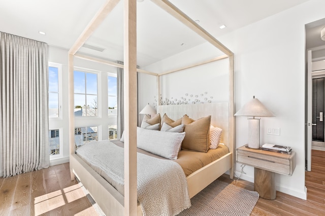 bedroom with light wood-type flooring