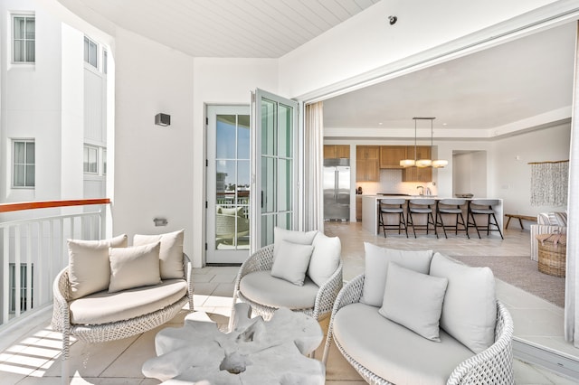 living room featuring an inviting chandelier