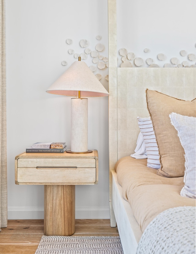 bedroom with light hardwood / wood-style floors