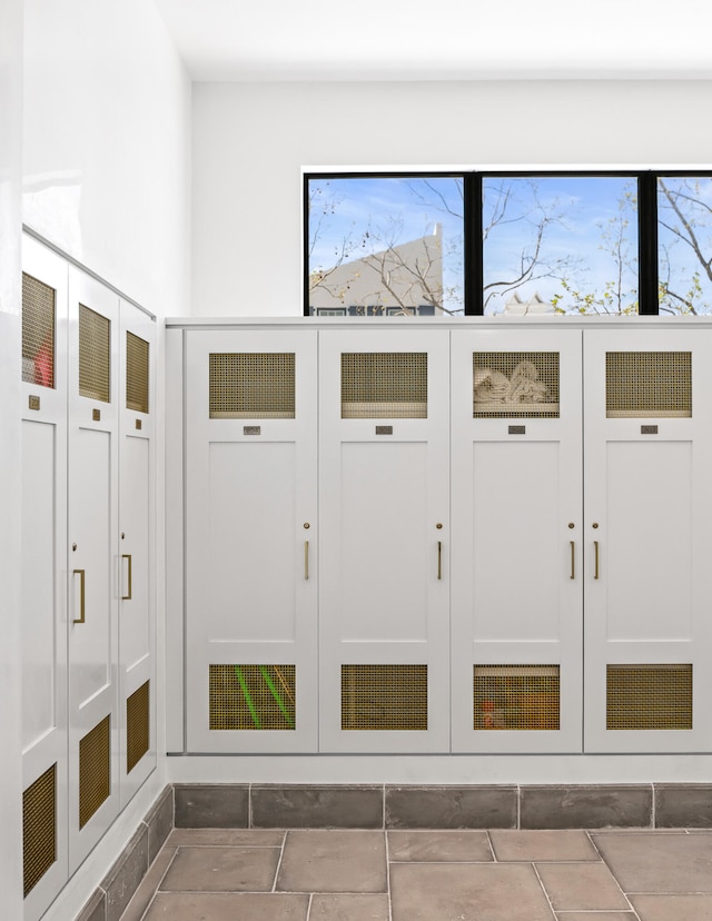 mudroom with tile floors