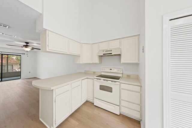 kitchen featuring ceiling fan, light hardwood / wood-style flooring, electric range, and white cabinetry