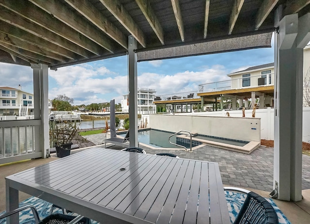 deck featuring a dock and a water view