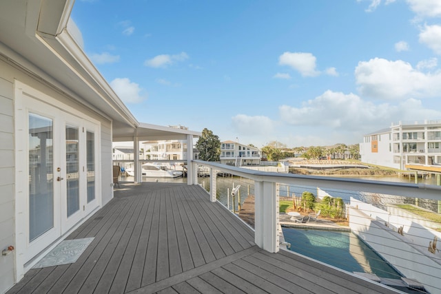 wooden terrace featuring french doors