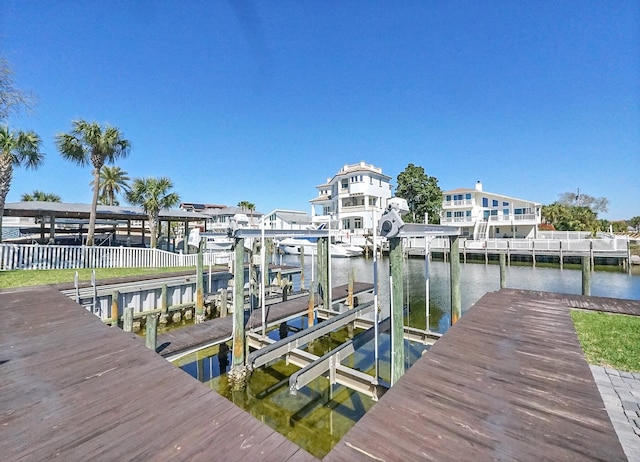 dock area with a water view