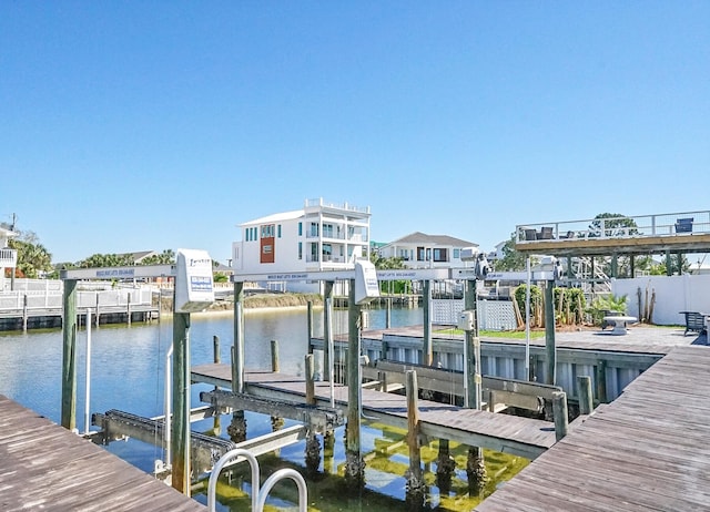 view of dock with a water view