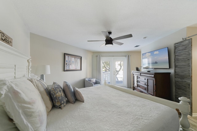 bedroom with french doors and ceiling fan