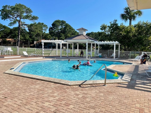 view of swimming pool featuring a gazebo, a patio area, and a pergola