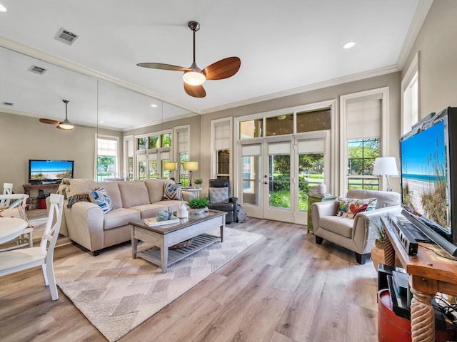 64 Vantage Pt Unit 64, Miramar Beach, FL 32550 - living area featuring crown molding, ceiling fan, light wood-style floors, and visible vents