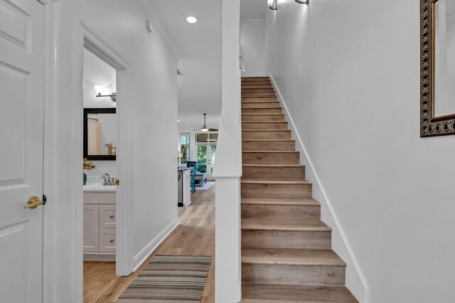 64 Vantage Pt Unit 64, Miramar Beach, FL 32550 - stairway featuring baseboards, recessed lighting, and wood finished floors