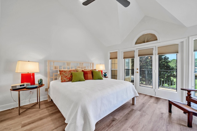 64 Vantage Pt Unit 64, Miramar Beach, FL 32550 - bedroom featuring access to outside, wood finished floors, and high vaulted ceiling