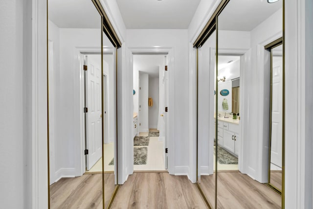 64 Vantage Pt Unit 64, Miramar Beach, FL 32550 - hall featuring baseboards and light wood-style flooring