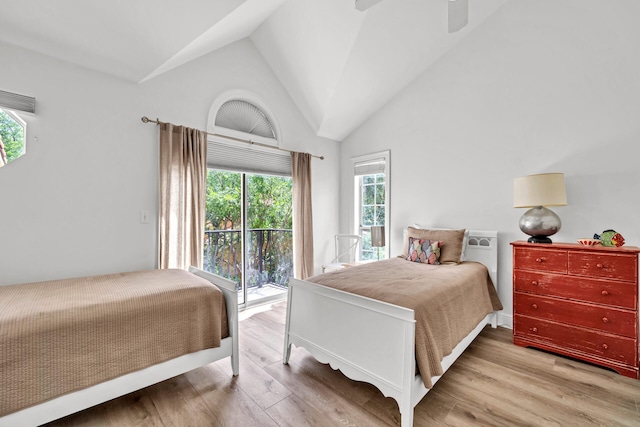 64 Vantage Pt Unit 64, Miramar Beach, FL 32550 - bedroom featuring vaulted ceiling, wood finished floors, and access to exterior