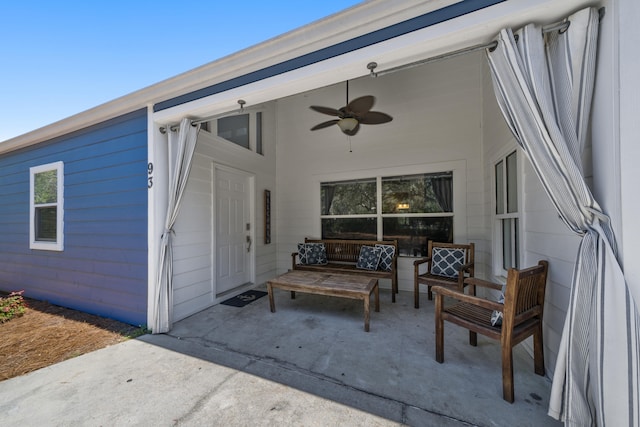 view of patio / terrace featuring ceiling fan