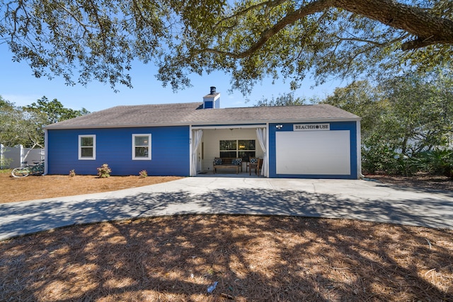 single story home with a garage