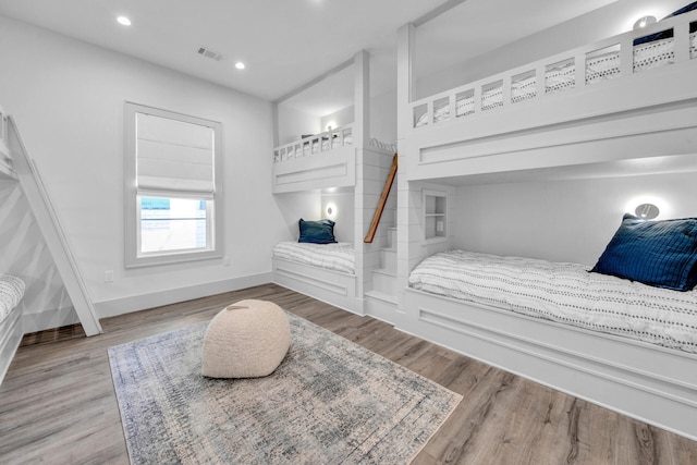 bedroom featuring wood-type flooring