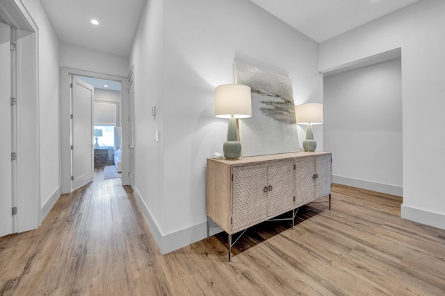 corridor featuring hardwood / wood-style flooring