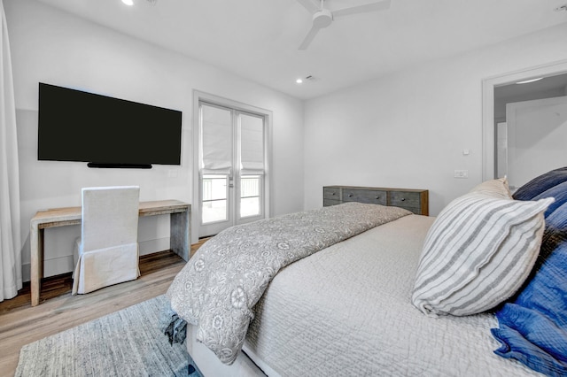 bedroom featuring wood-type flooring and ceiling fan