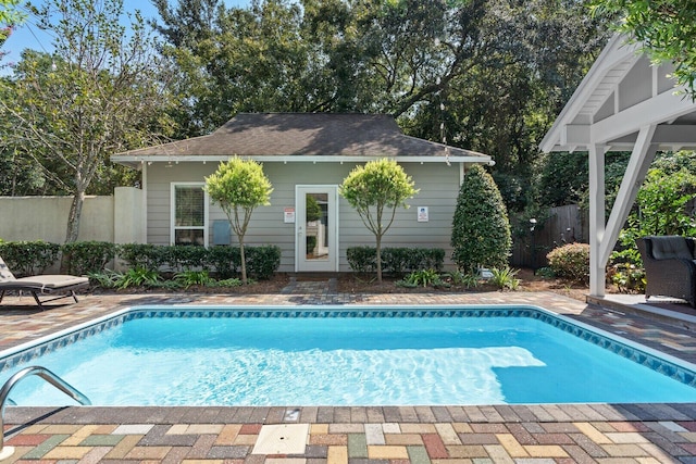 view of swimming pool featuring a patio