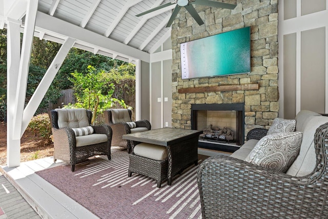 view of patio / terrace with an outdoor stone fireplace