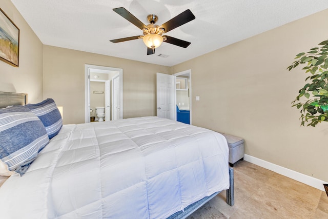 bedroom with connected bathroom, ceiling fan, and light tile flooring