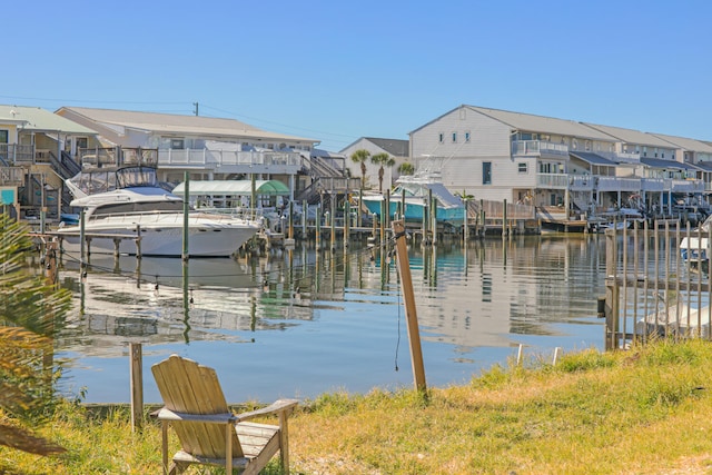 dock area with a water view