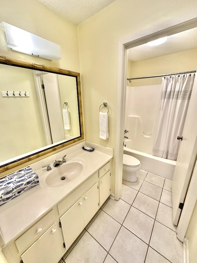 full bathroom with shower / tub combo, vanity, a textured ceiling, tile patterned flooring, and toilet