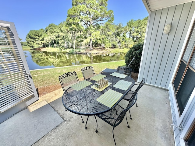 view of patio / terrace with a water view