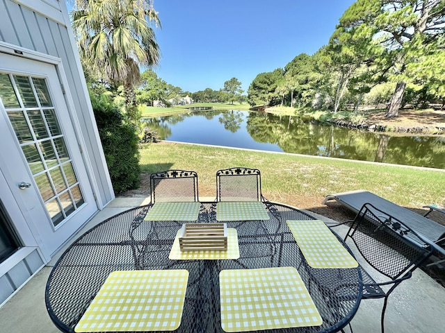 view of patio featuring a water view