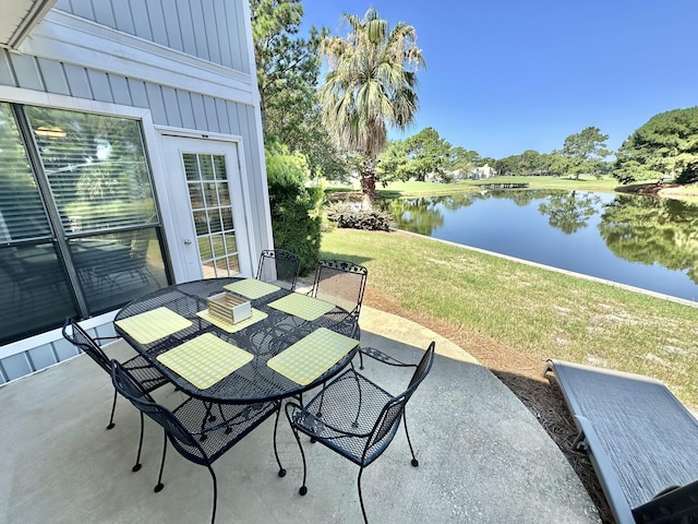 view of patio / terrace with a water view