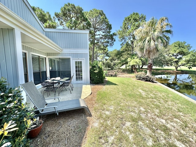 view of yard with a water view