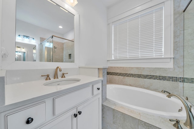 bathroom with vanity and plus walk in shower