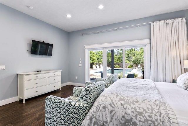 bedroom with access to outside and dark hardwood / wood-style flooring