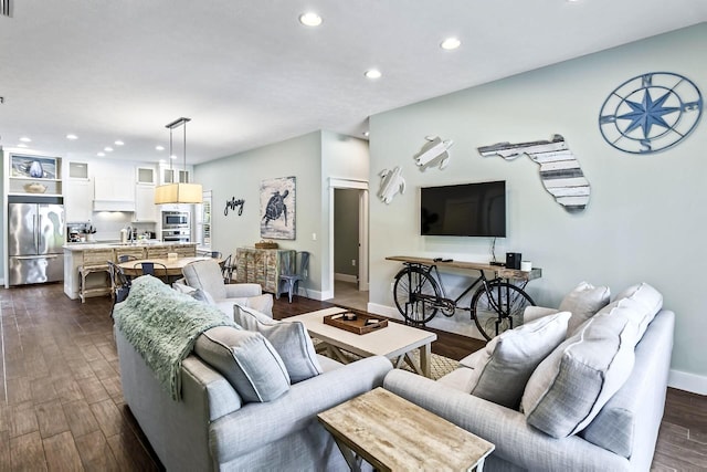 living room featuring dark wood-type flooring