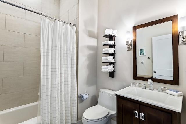 full bathroom featuring vanity, shower / bath combo, and toilet