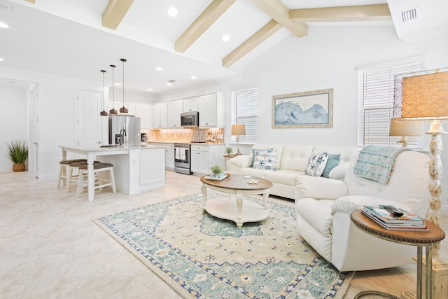 living room with high vaulted ceiling, beam ceiling, and light tile patterned floors