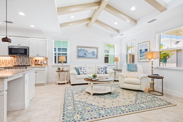 tiled living room featuring lofted ceiling with beams