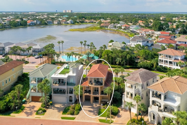 bird's eye view with a water view