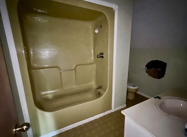 bathroom featuring shower / bathtub combination, tile floors, and vanity