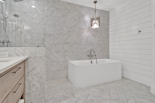 bathroom featuring vanity and separate shower and tub