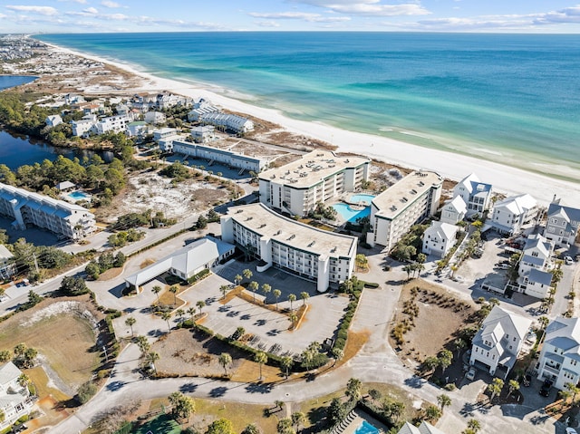 bird's eye view with a view of the beach and a water view