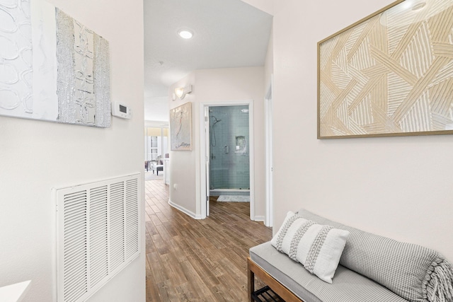 hallway featuring wood-type flooring