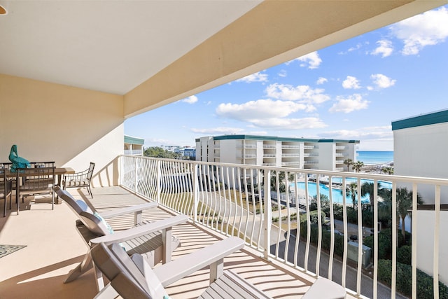 balcony featuring a water view