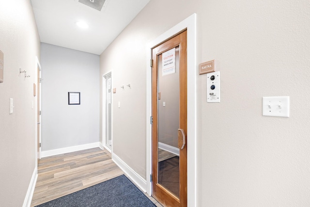 hall featuring light wood-type flooring